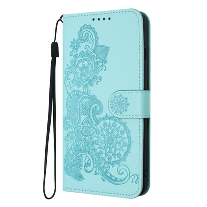 For Xiaomi Redmi K70 Datura Flower Embossed Flip Leather Phone Case(Light blue) - K70 Cases by buy2fix | Online Shopping UK | buy2fix